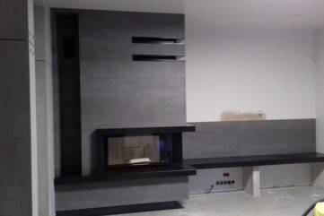 A fireplace -Laminam Naturali Pierta di Savoia Grigia Quartz sinter