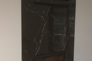 A fireplace structure front -Neolith Nero Marquina Quartz sinter
