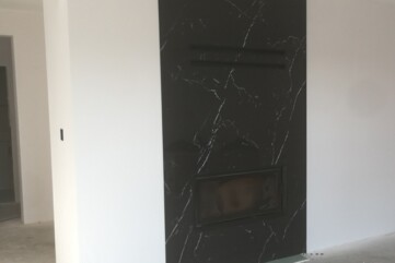 A fireplace structure front -Neolith Nero Marquina Quartz sinter